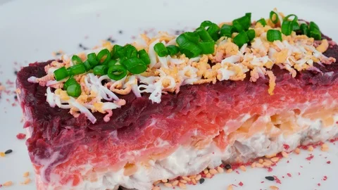 Dressed Herring under Fur coat, layered salad with boiled vegetables Stock Footage 94332623