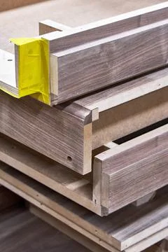 Dresser elements in a workshop. Solid wood chest of drawers. Furniture manufa Stock Photos