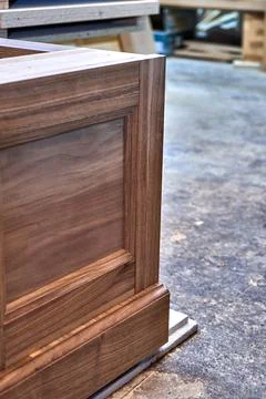 Dresser elements in a workshop. Solid wood chest of drawers. Furniture manufa Stock Photos