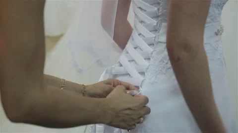 Dressing bride in wedding salon Stock Footage 60600551