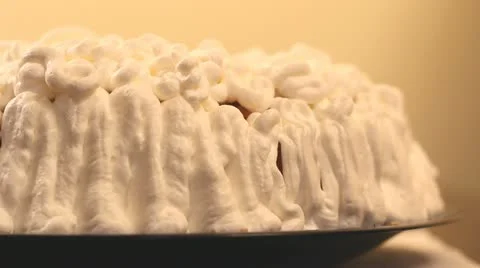 Dressing a cake with cream Video stock 12303525