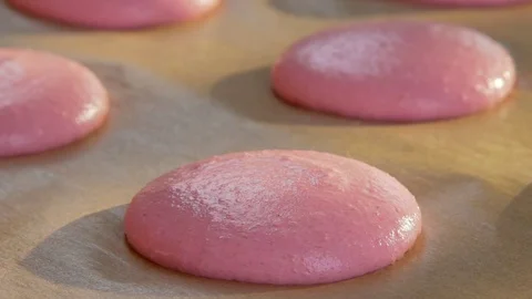 Dressing for macaroon dough elements in the shape of a heart Stock Footage 71288265
