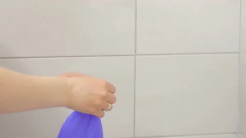 Dressing a Protective Glove on Arm Stock Footage 130400272