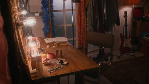 Dressing Table with Make-Up in Empty 70s Artists Room Stock Footage 299167716