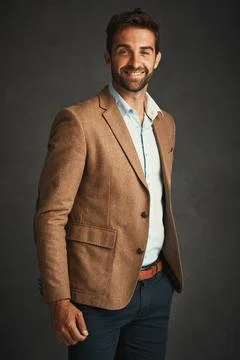 Dressing well is a form of good manners. Studio shot of a handsome young man Stock Photos