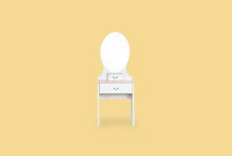 Dressing white Table isolated on yellow background with space for copy. 스톡 사진