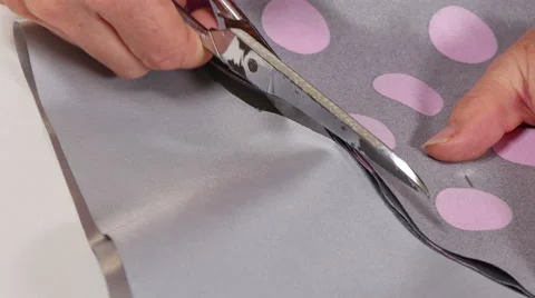 Dressmaker Cutting Clothes with Scissors Closeup Stock Footage 59739074