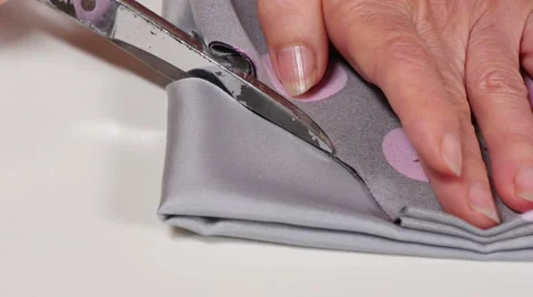 Dressmaker Cutting Clothes with Scissors Closeup Stock Footage 59739178