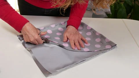 Dressmaker Cutting Clothes with Scissors Stock Footage 59739137