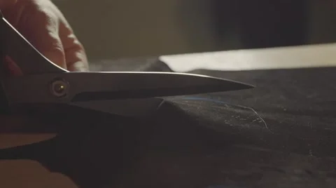 Dressmaker cutting fabric Stock Footage 61523707
