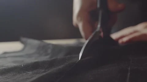 Dressmaker cutting fabric Video stock 61523716