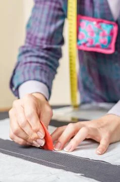 Dressmaker design tailor pattern on the table Stock Photos