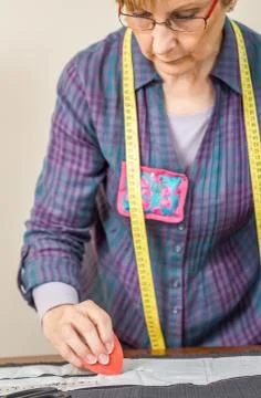 Dressmaker design tailor pattern on the table Stock Photos