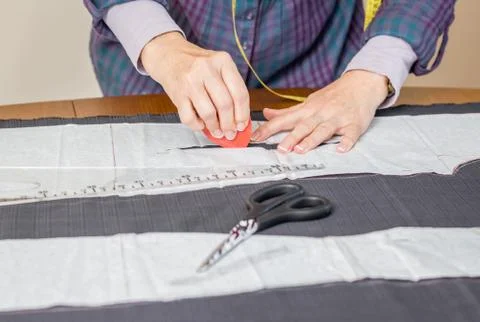 Dressmaker design tailor pattern on the table Stock Photos