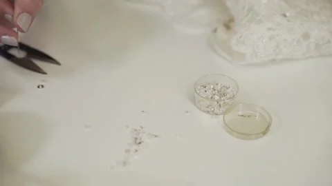 Dressmaker working on beautiful wedding dress Stock Footage 148268853