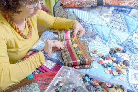 Dressmaker working on her patchwork Stock Photos