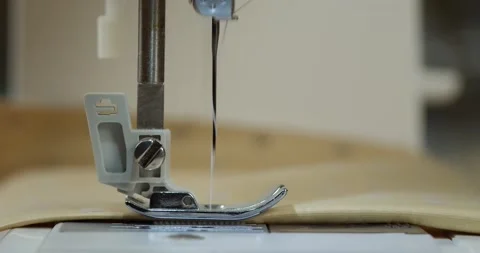 Dressmaker working on sewing machine close-up. Tailoring and professional Stock Footage 167895338