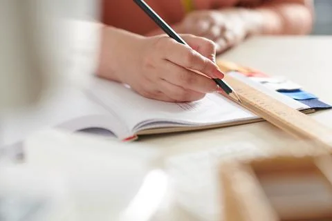 Dressmaker Working on Technical Drawing Stock Photos