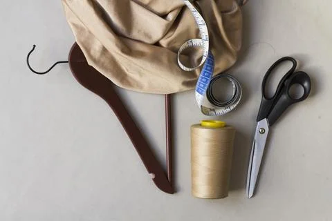 Dressmaker workspace with tools hanger. High quality beautiful photo concept Stock Photos