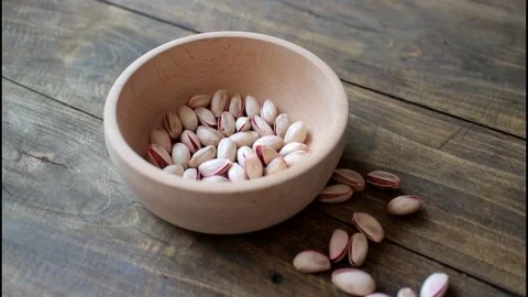 Dried appetizing pistachios Stock Footage 73621319