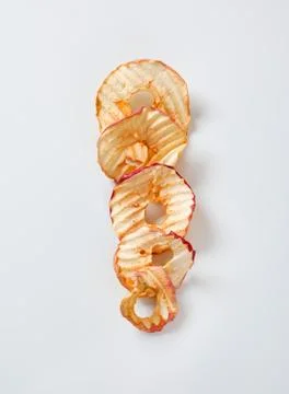 Dried apple chips Stock Photos