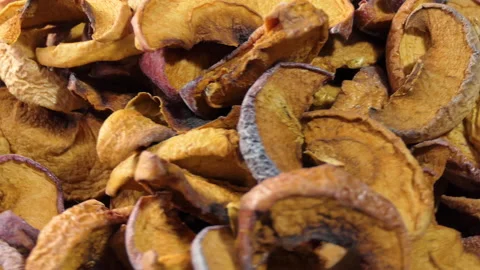 Dried apples on a light background. Dried apples. Dried fruit apples. Fruit for Stock Footage 188312709