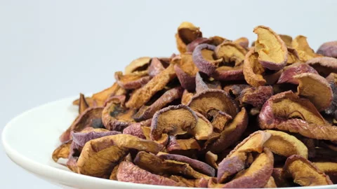 Dried apples on a light background. Dried apples. Dried fruit apples. Fruit for Stock Footage 188315995