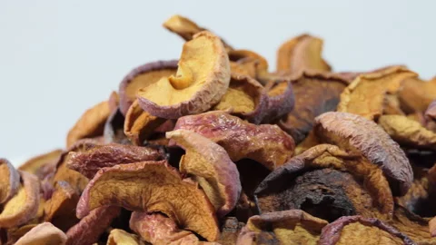 Dried apples on a light background. Dried apples. Dried fruit apples. Fruit for Stock Footage 189984734