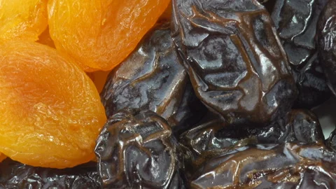Dried apricots and dates rotate Video stock 158909675