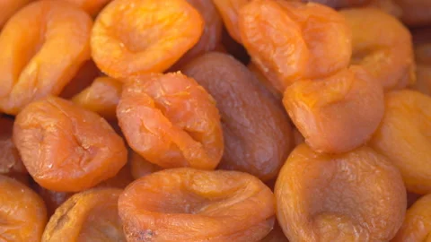 Dried apricots on the counter close-up Stock Footage 113774076