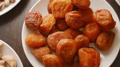 Dried apricots - organic fruit full of vitamines and microelements Stock Footage 165528002