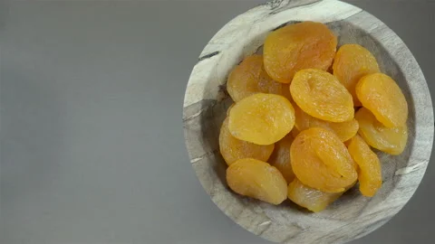 Dried apricots in plate in 4K Video stock 137777418