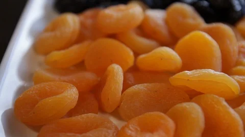 Dried apricots.close-up.macro.the camera moves around this to the left Stock Footage 121518790