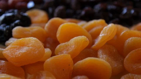 Dried apricots.close-up.macro.the camera moves around this to the right Stock Footage 122410786