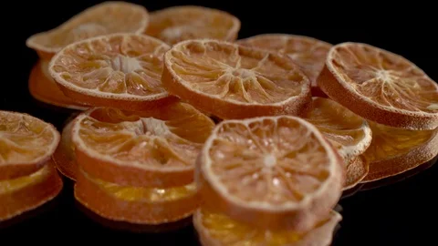 Dried assorted citrus on black background spin or rotate. Stock Footage 124417800