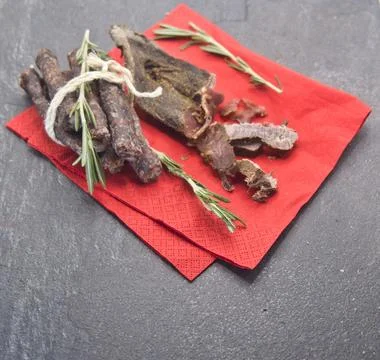 Dried beef jerky and dried sausae Stock Photos