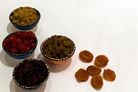 Dried berries in ceramic cups Stock Photos