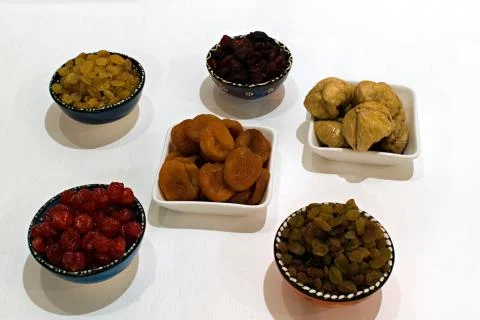 Dried berries in ceramic cups Stock Photos