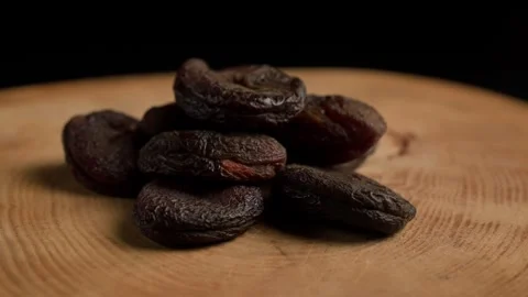 Dried Black Apricots Turning Stock Footage 283769605