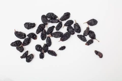 Dried black grapes, Pattern of nuts form Stock Photos