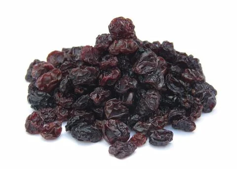 Dried Blackcurrant on white background  Stock Photos