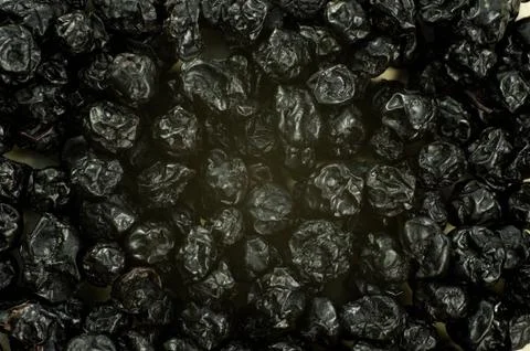 Dried blueberries background. Stock Photos
