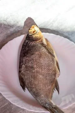 Dried bream. against the general background. there is a tint. plate Stock Photos
