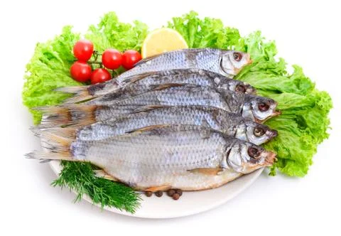 Dried bream on a plate Stock Photos