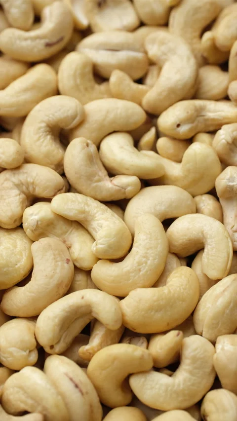 Dried cashew nuts close up, rotation. Healthy Food concept Stock Footage 277478938