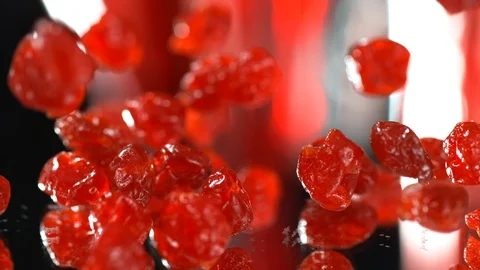 Dried cherry drops on a table in the background in SLOW MOTION, 4k, phantom Stock Footage 114980180