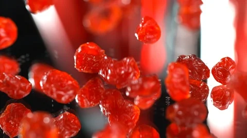 Dried cherry drops on a table in the background in SLOW MOTION, 4k, phantom Stock Footage 114980304