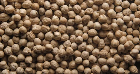 Dried chickpeas close up studio shot over rotating Vidéo 334255037