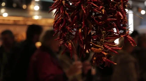 Dried Chilli hanging in market Vidéo 48710587