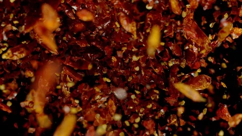 Dried chilli peppers explosion. Slow Motion. Stock Footage 127701938